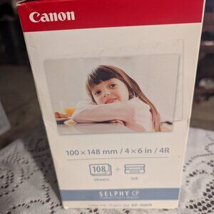 NIB Canon Selphy photo paper and ink